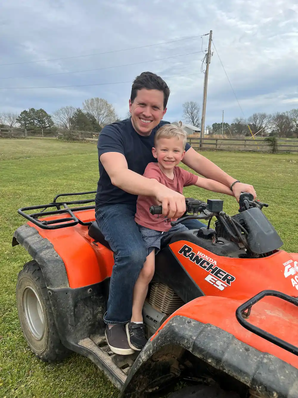 image003 Anthony and Son enjoying a ride on an ATV