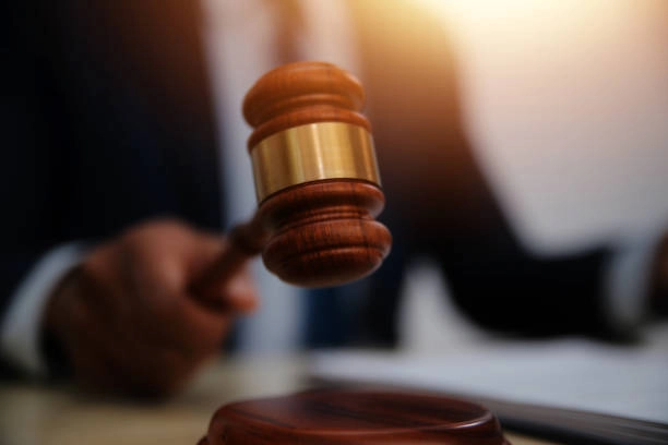 A judge pounding a gavel